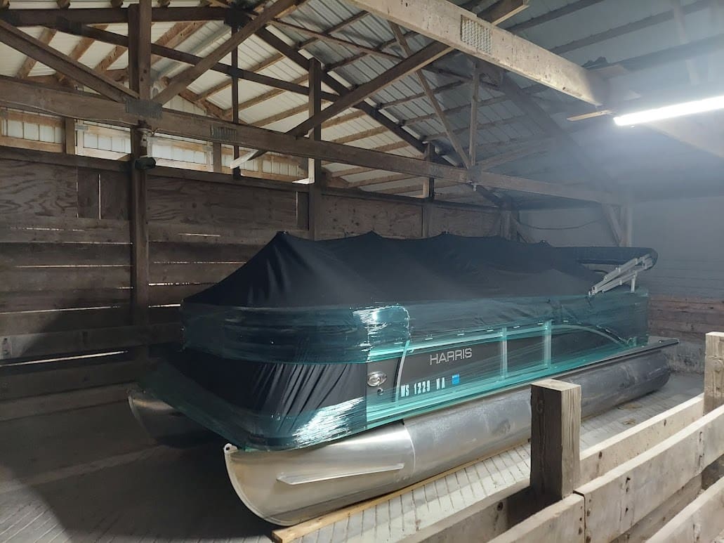 covered boat 3 Image with girl little league softball team that is sponsored by In-N-Out Storage
